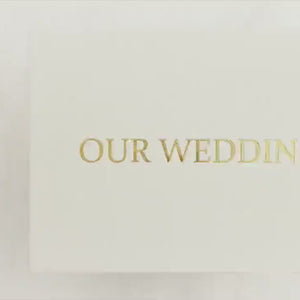 Interactive Motion Book showcasing a couple’s wedding highlights in a luxury video album format